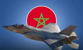 A Moroccan Air Force fighter jet performing high-altitude aerial maneuvers, with the Moroccan flag visible on the aircraft.