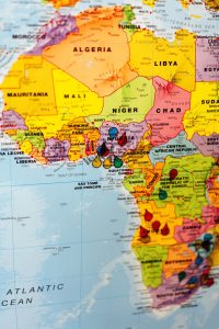Africa today: vibrant urban scene with citizens, media, and activity highlighting political, economic, and social developments in Africa and South Africa